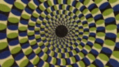 An Optical Illusion Of Lots Of Different Colors And Shapes Going In A Clockwise