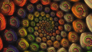 Multi Colored Round Objects In Pattern Twirl On Screen Objects Get Smaller