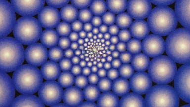 A Rotating Picture Of Spheres That Are Blue On The Outside And Have A White