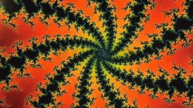 Close Up Rotating Orange Green And Black Kaleidoscope Design
