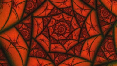 A Pattern Of Red And Black Shapes Swirls In A Circle