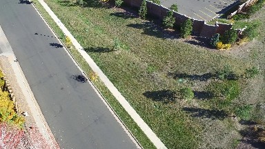 HIDDEN LAKE COLORADO-2016: Aerial Footage Of A Grassy Field Near A Parking Lot