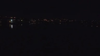 DENVER COLORADO-2016: Flying At Night Time Over A City The Sky Is Very Dark