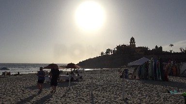 LOS CABOS MEXICO-2017: Beach At Dusk People Walking On The Sand And Having Fun