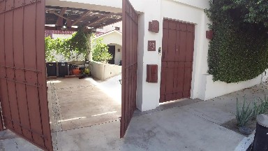 LOS CABOS MEXICO-2019: A View Of An Automatic Door Opening To A House In The