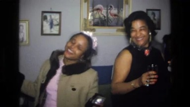 1976: Harlem New York Usa. A Couple Of Women Standing Next To Each Other.