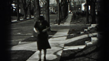 1946: Harrisburg PA. A Black And White Photo Of A Woman In A Dress.