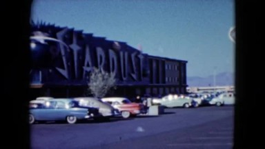 1959: Nevada, USA. A Bunch Of Cars That Are Parked In Front Of A Building.