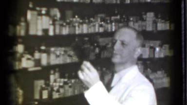 1939: Danielson Connecticut. A Black and White Photo Of A Man Talking On A Cell