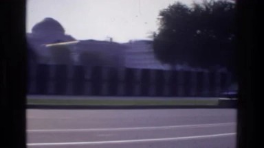 1975: Washington Dc, USA. A Red And White Bus Driving Down A Street.