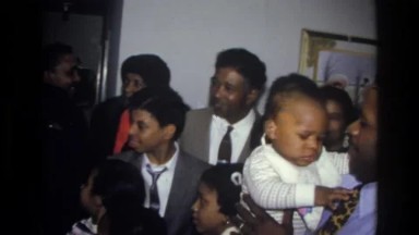 1976: Harlem, New York, USA. A Group Of People Standing Next To Each Other.
