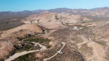 CABO PULMO EAST CAPE BCS MEXICO-2023: An Aerial View Of A Dirt Road In The Arid Landscape