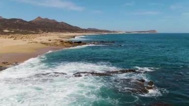 BUZZARDS BEACH EAST CAPE BCS MEXICO-2023: A Long Stretch Of Water With A Beach In