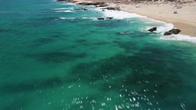 BUZZARDS BEACH EAST CAPE BCS MEXICO-2023: Aerial View Of A Beach And The Ocean