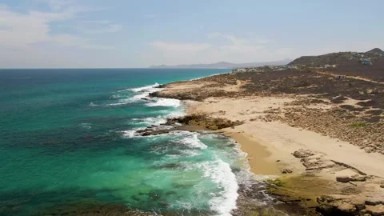 BUZZARDS BEACH EAST CAPE BCS MEXICO-2023: Aerial View Of A Beach And The Ocean