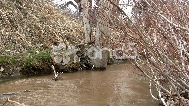 (Seamless Loop) Overflowing Muddy Barren Creek