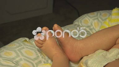Closeup of Two Baby's Feet