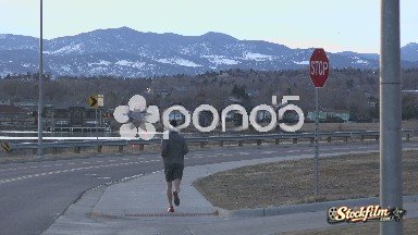 Aspen, Colorado, United States: Man Jogging On Dust Car Drive
