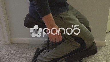 Los Angeles, United States: Man Sitting on Kneel Chair