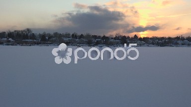 View of Frozen Lake in Sunset