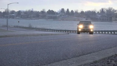United States-2015: Car Driving into Hail Storm on Road