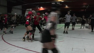 DENVER, COLORADO-2015: Roller Derby Fighting and Knockdown
