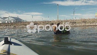 Dog Coming At Kayak POV Waterlevel