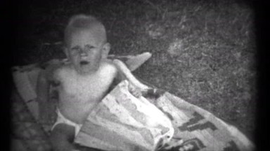 (1940's 8mm Vintage) Baby Playing Outside - 2 Clips