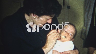 (8mm Vintage) Mom Feeding Baby 1956