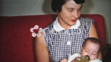 (8mm Vintage) 50's Girl Taking Care of Baby 1957