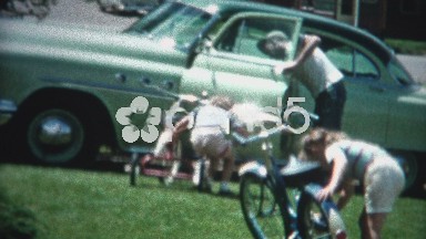 (8mm Film) Family Cleaning Vehicles in Yard 1956