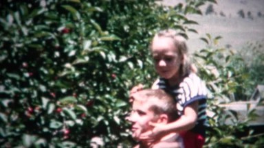 (8mm Film) Picking Cherries On Shoulder 1953