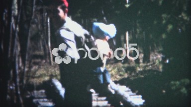(8mm Film) 1952 Man Hiking With Baby Backpack