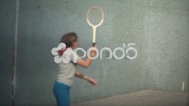 (8mm Vintage) 1971 Women Playing Tennis Against Wall