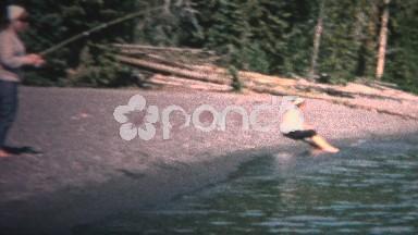 (8mm Vintage) 1968 Women Catching Fish Long Pole Shore