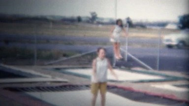 (8mm Vintage) 1962 Trampoline Jumping Busy Highway Behind