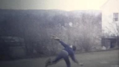 (8mm Vintage) 1965 Kid Throwing Baseball High Into Air