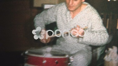 (8mm Vintage) 1965 Dad and Son Playing Drums Together Christmas Morning