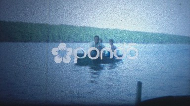 Arkansas, USA - 1964: Boat Trip with Kids Showing Off Fishing Catch