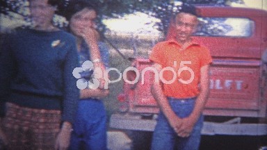 Arkansas, USA (1965): Family hanging out around the classic Chevy truck.
