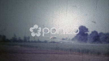 Arkansas, USA (1966): Airplane crop dusting over soybean fields.