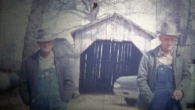 Arkansas, USA - 1966: Farmer Brothers Wearing Fedora Hats and Overalls