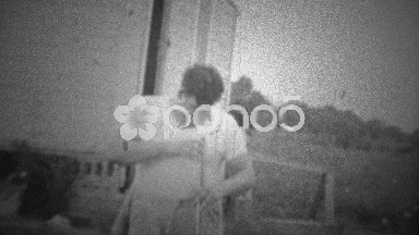 Oklahoma, USA (1943): Man joking around with a shotgun.