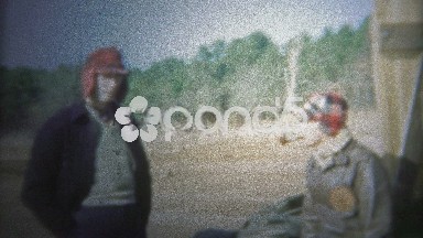 1956: Family getting ready for a trip, outside of the family fishing shack.