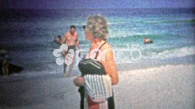 PANAMA CITY, USA - 1959: Woman Wearing a Designer Swimsuit at the Beach
