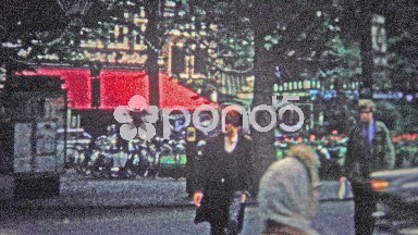 Cologne, Germany (1966): Folks crossing the busy street to hail a taxi.