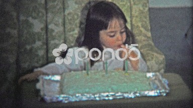 Boulder, CO. USA - 1974: Little Girl Playing With Birthday Cake As She Waits For