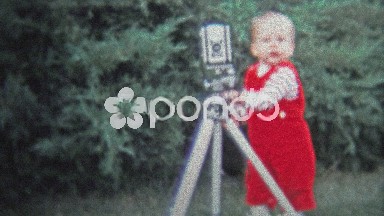 Dallas, TX - 1971: Baby Hilariously Working the Camera on a Tripod.