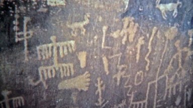 1972: Man Discovering Navajo Native American Cave Drawing in Arizona