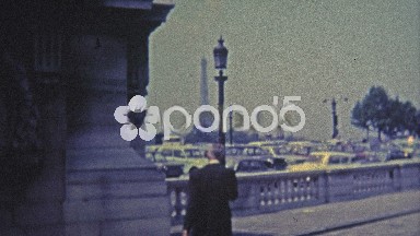 1969: Proud Frenchman Poses by Eiffel Tower